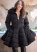 Venus Peplum Puffer Coat in Black