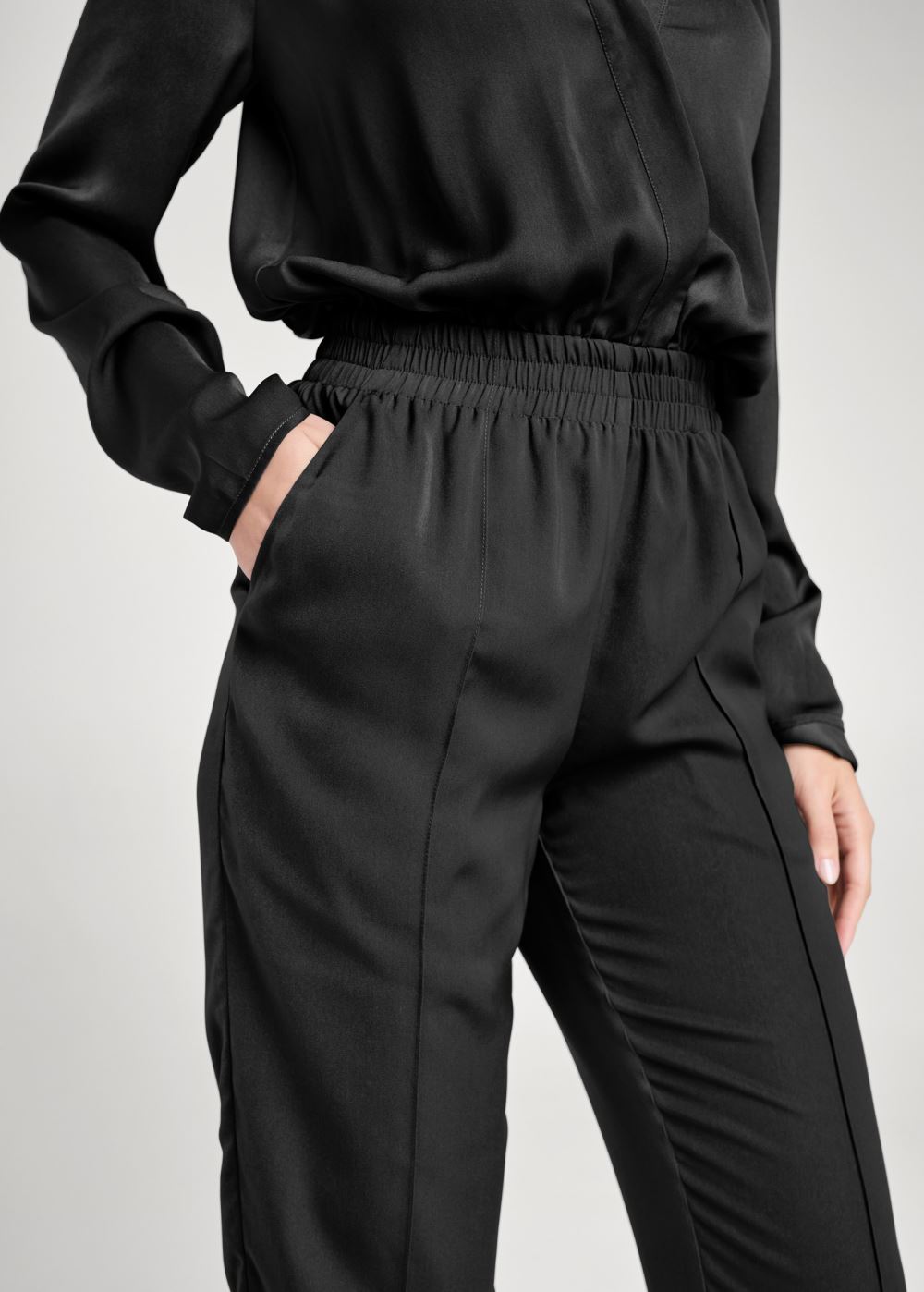 Venus Smocked Jogger Jumpsuit in Black